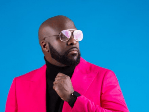 Black man in pink coat