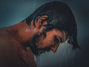 man taking shower