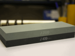 black and gray slab of whetstone