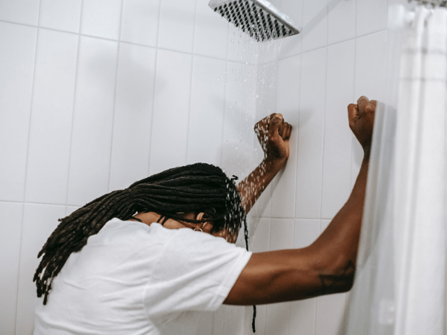 man taking a shower