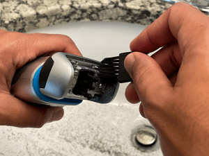 cleaning electric razor with brush
