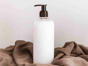 bottle of moisturizer on a cloth