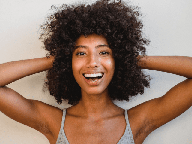Black woman with curly hair