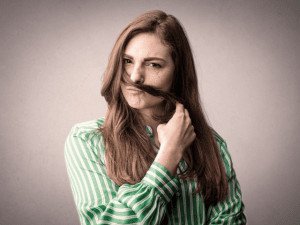 woman smelling her hair